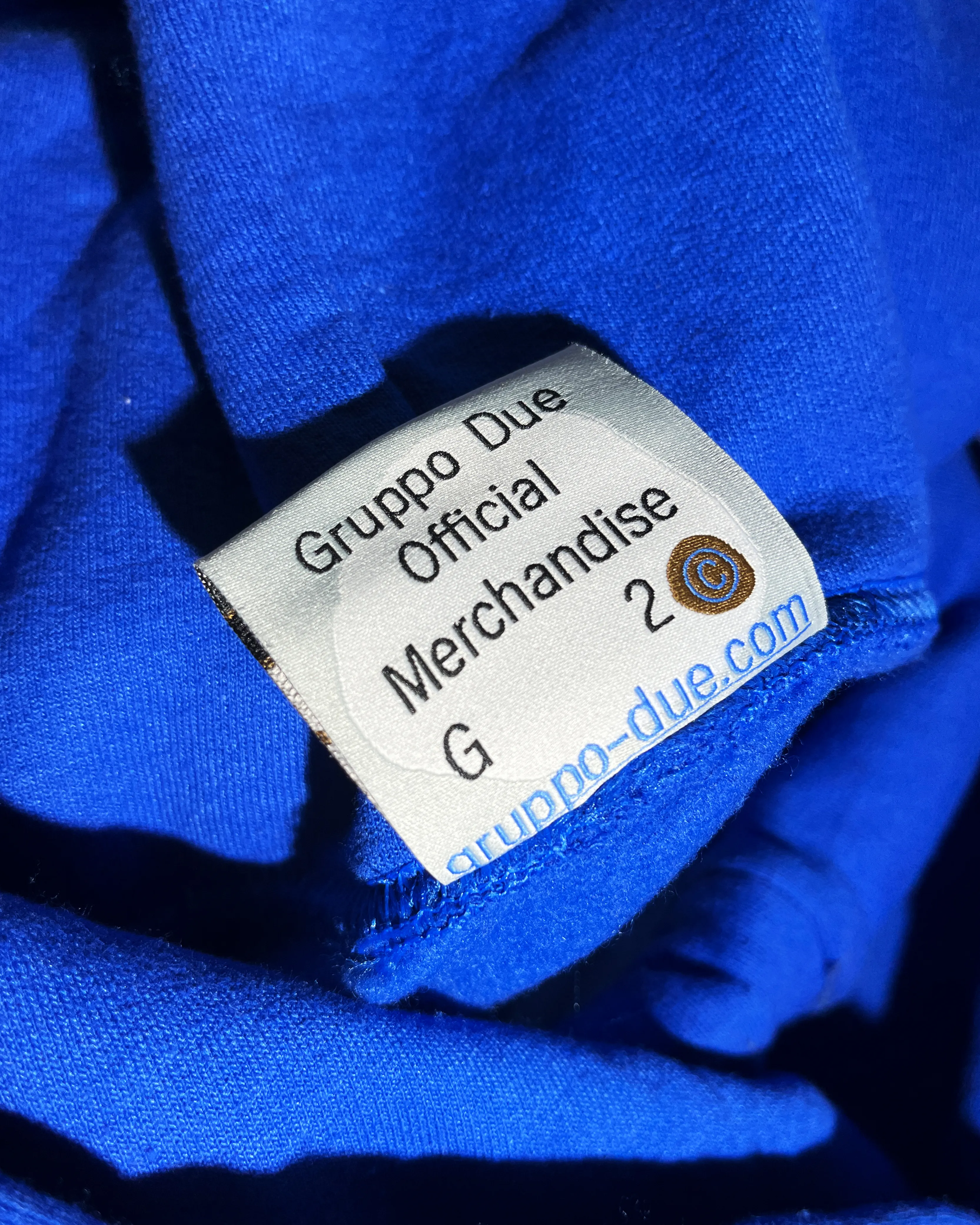 Close-up of the label within the hoodie